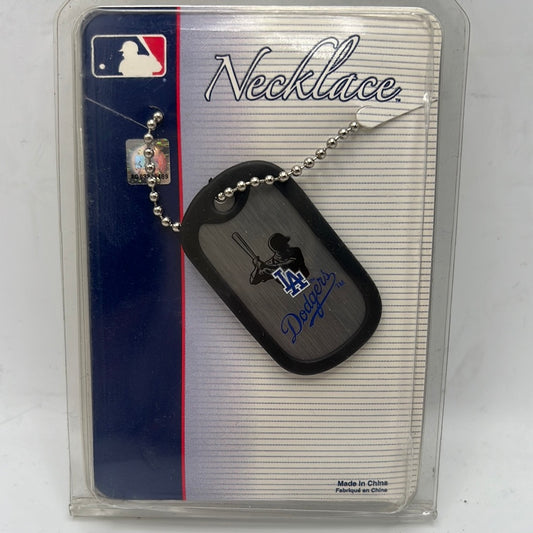 Los Angeles Dodgers MLB Wincraft Dog Tags Necklace
DODGER STADIUM Est. 1962
WORLD SERIES CHAMPIONS 1955 1959, 1963, 1965, 1981, AND-1988
PETER DAVID/MLBP 2002 www.peterdavid.com