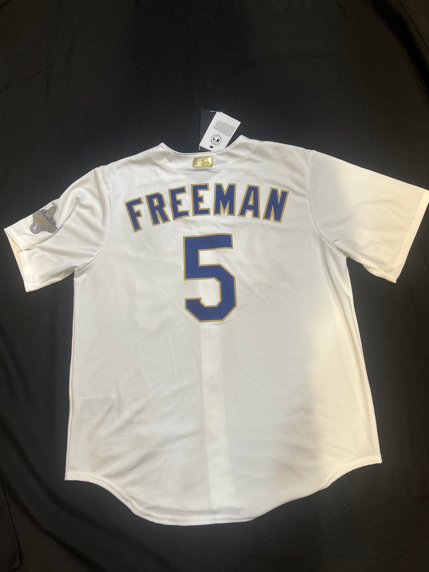 Los Angeles Dodgers MLB Genuine Merchandise Nike Gold Elite 2025 World Series Champions #5 Freeman Authentic Replica Men Jersey