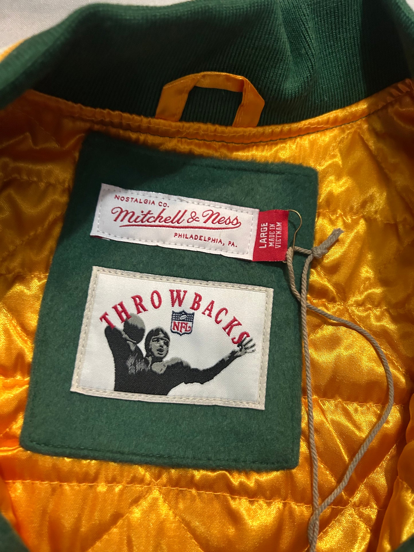 Green Bay Packers NFL Mitchell & Ness Throwback Legacy Varsity Jacket